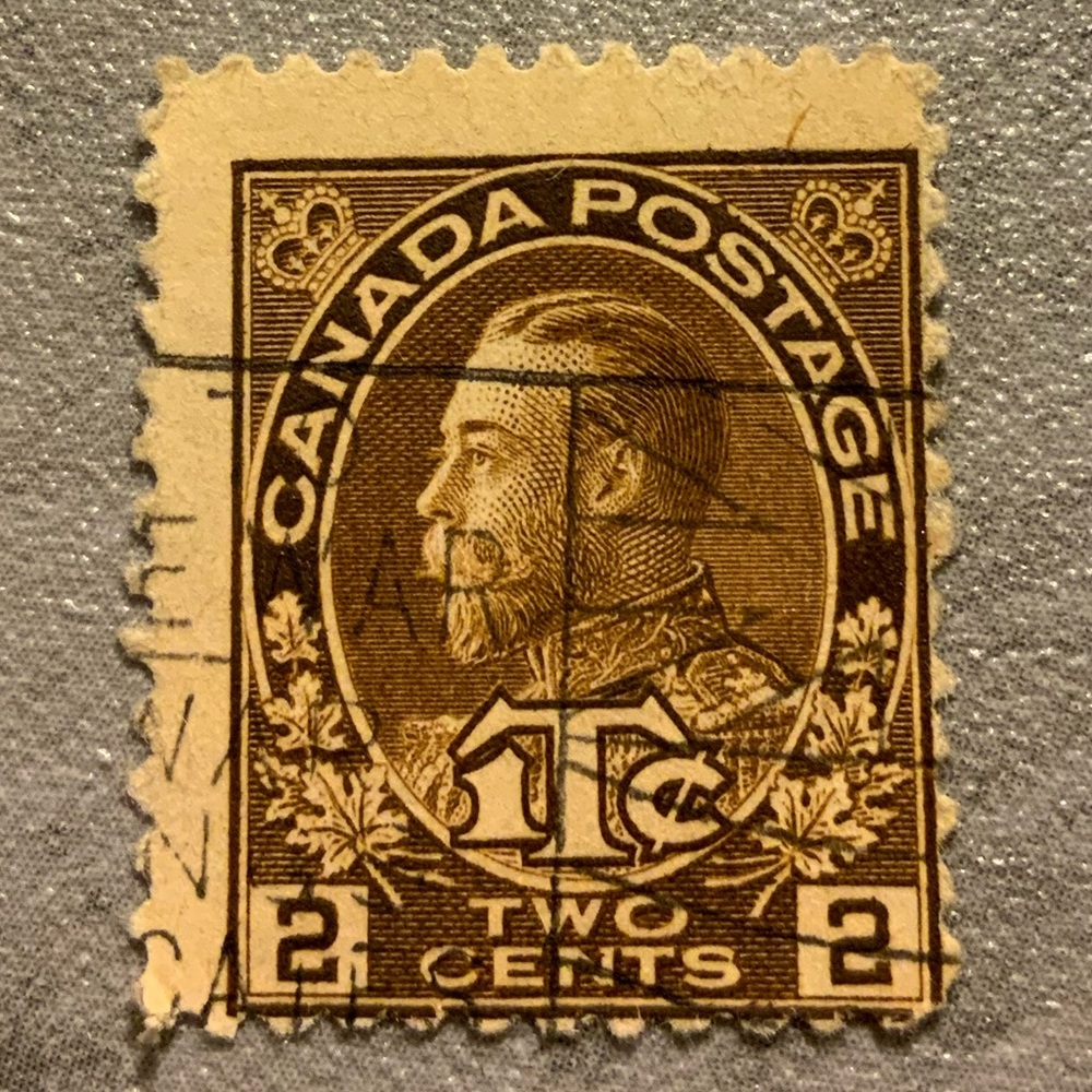 Rare collectible 1916 King George V with 1T¢ inscription stamp